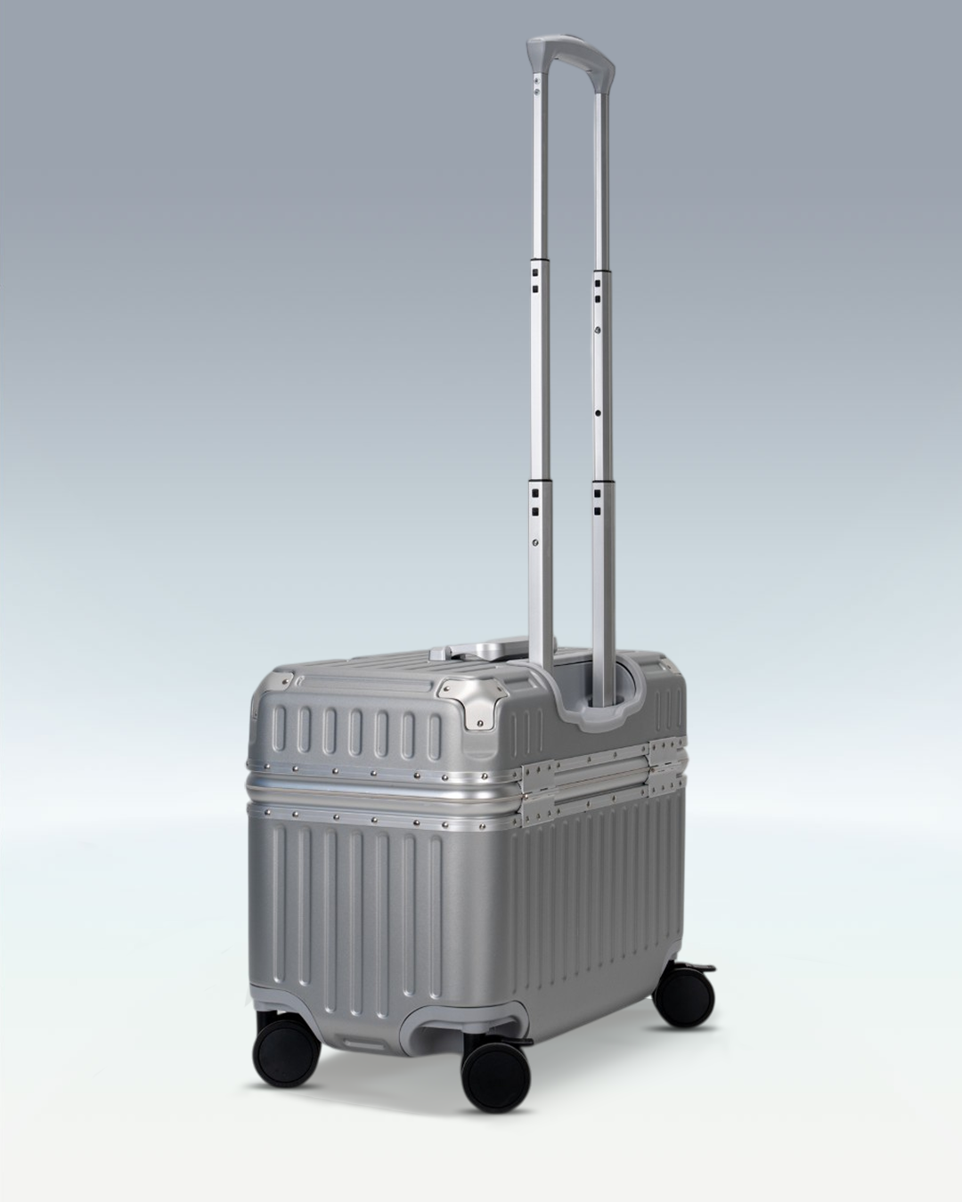 Portar Concord EdgeFrame pilot carry-on luggage in Lunar Silver, side profile with the telescoping handle extended