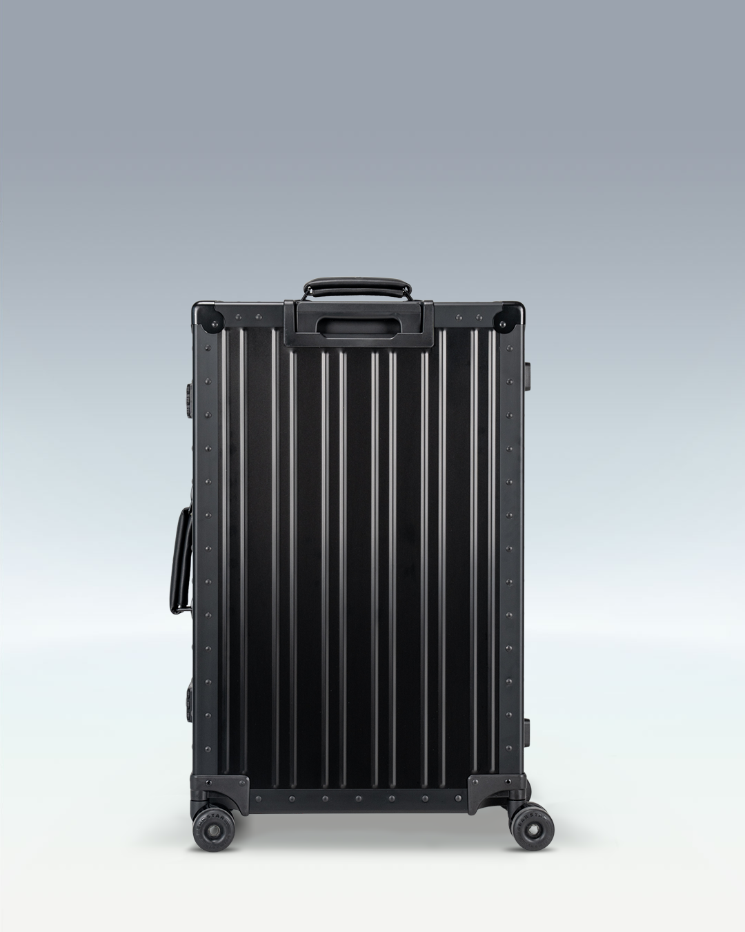 Portar Lucent aluminum checked luggage in Jet Black, back view