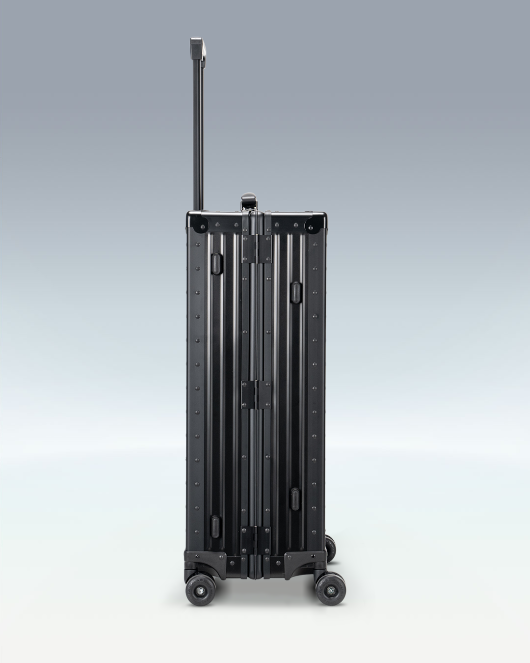 Portar Lucent aluminum checked luggage in Jet Black, side profile