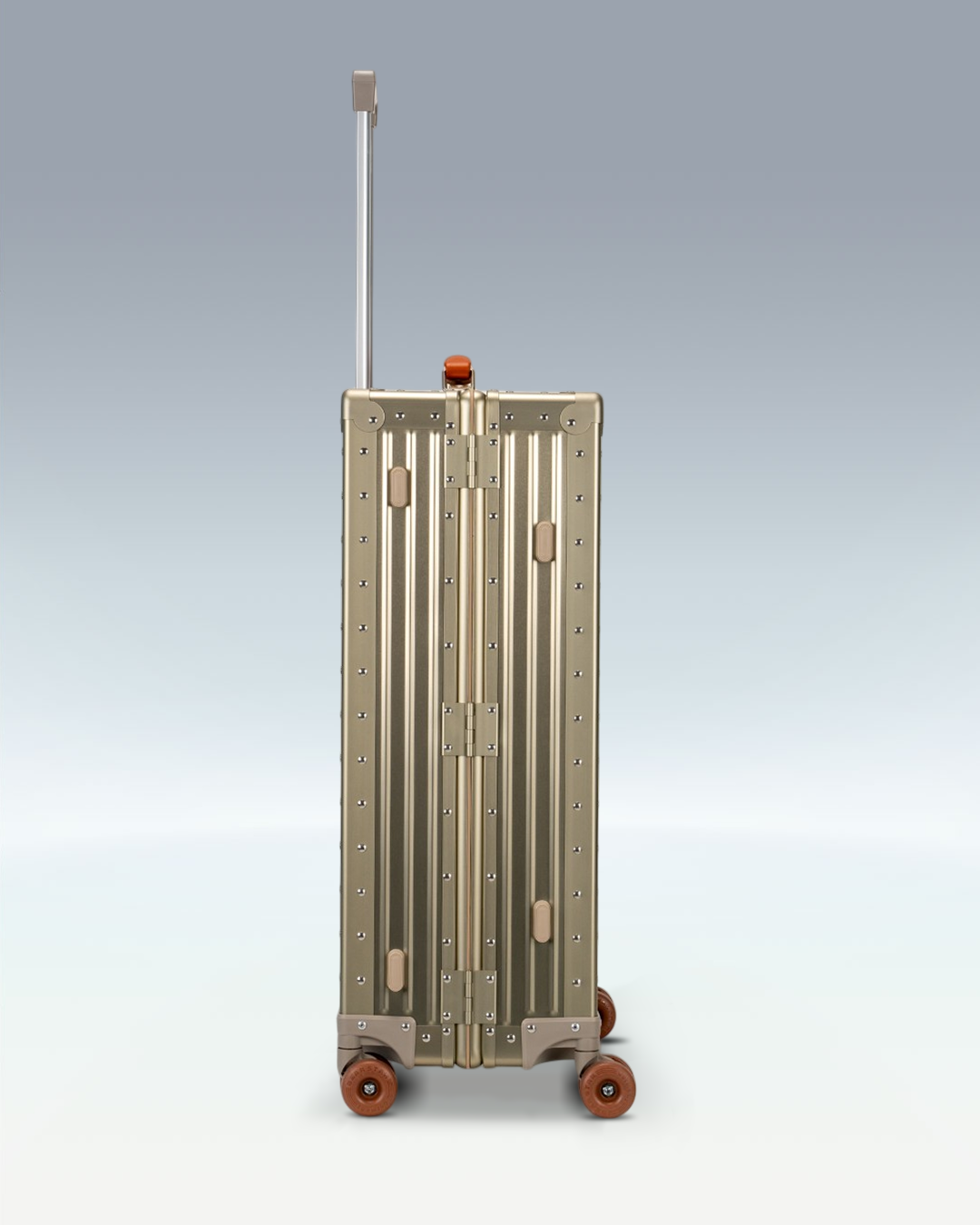 Portar Lucent aluminum checked luggage in Champagne Gold, side profile