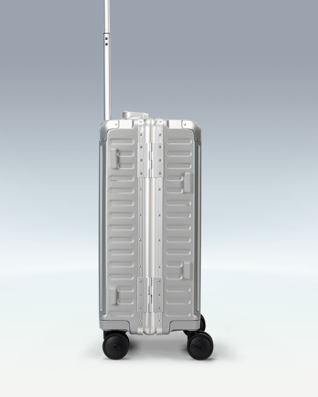 Portar Valence EdgeFrame carry-on luggage in Lunar Silver, side view showing the TSA-approved combination locks