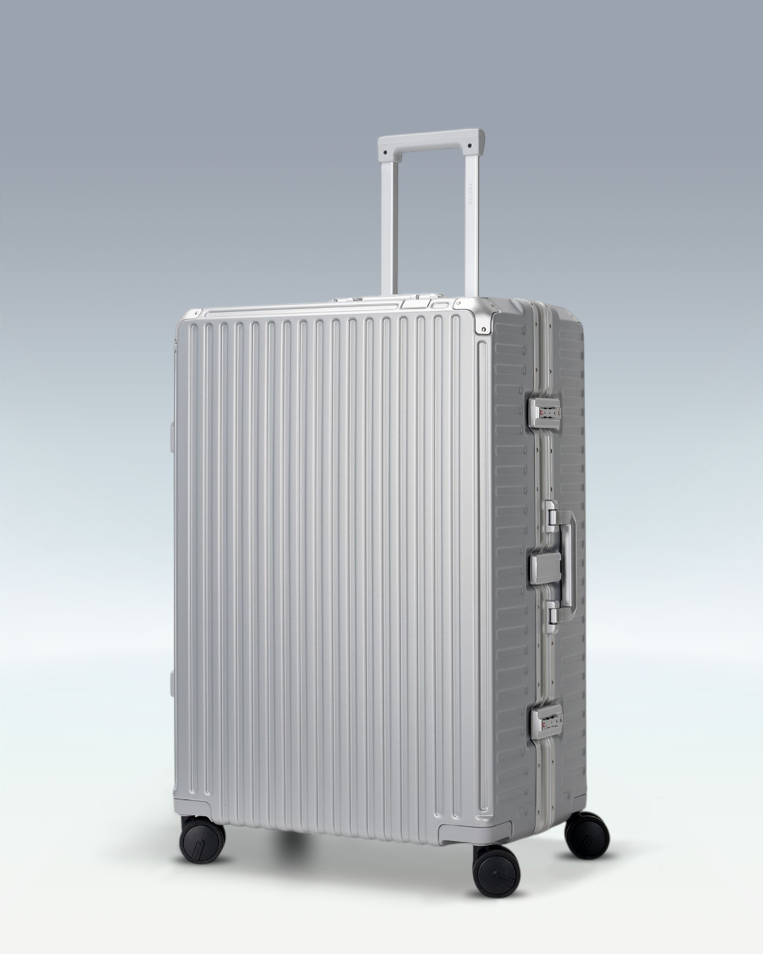 Portar Valence EdgeFrame checked luggage in Lunar Silver, three-quarter view with the telescoping handle extended