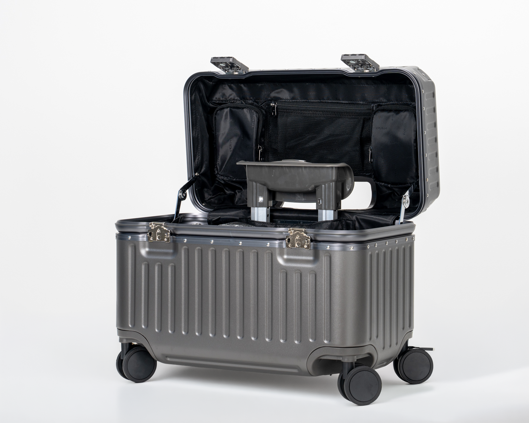 Portar Concord pilot carry-on suitcase in Dark Gull Gray, top-open view, polycarbonate shell with aluminum EdgeFrame