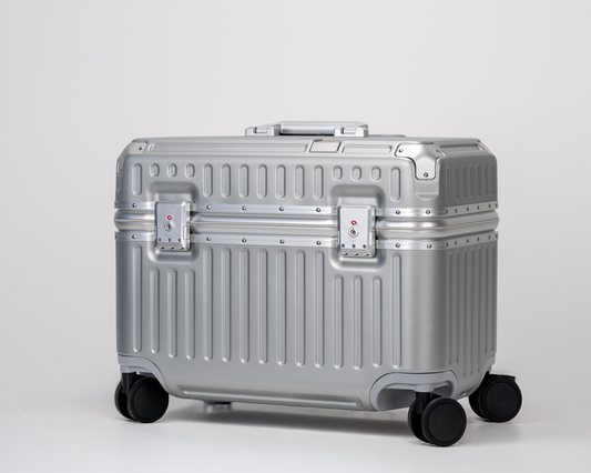 Portar Concord pilot carry-on suitcase in Lunar Silver, perspective view, aluminum EdgeFrame closed