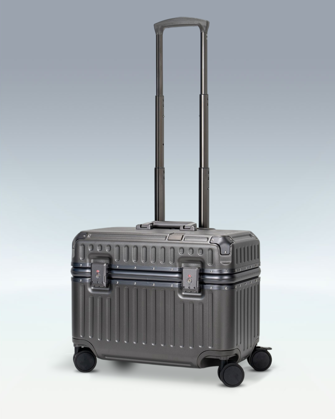 Portar Concord EdgeFrame pilot carry-on luggage in Dark Gull Gray, three-quarter view with the telescoping handle extended
