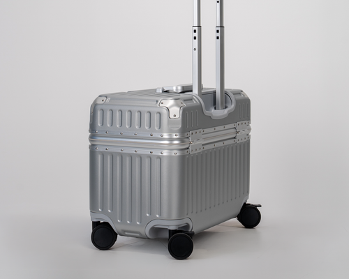 Concord Lunar Silver Polycarbonate Shell with Aluminum EdgeFrame Top-Access Pilot Carry-On Suitcase Side View by Portar