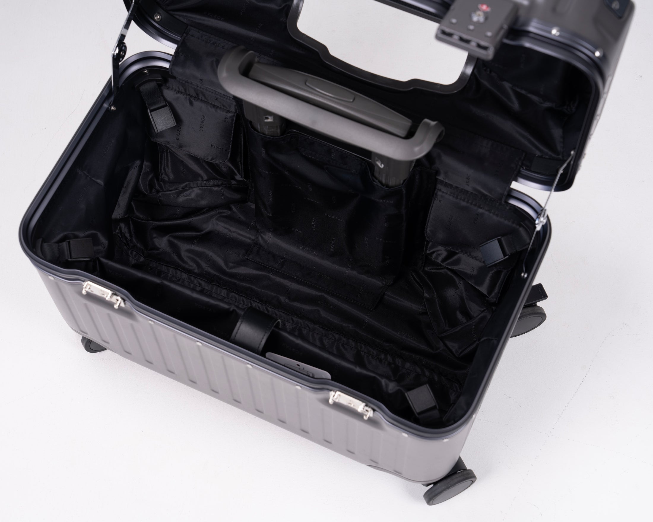 Concord Polycarbonate Shell with Aluminum EdgeFrame Top-Access Pilot Carry-On Suitcase Top Open with Laptop Sleeve View by Portar