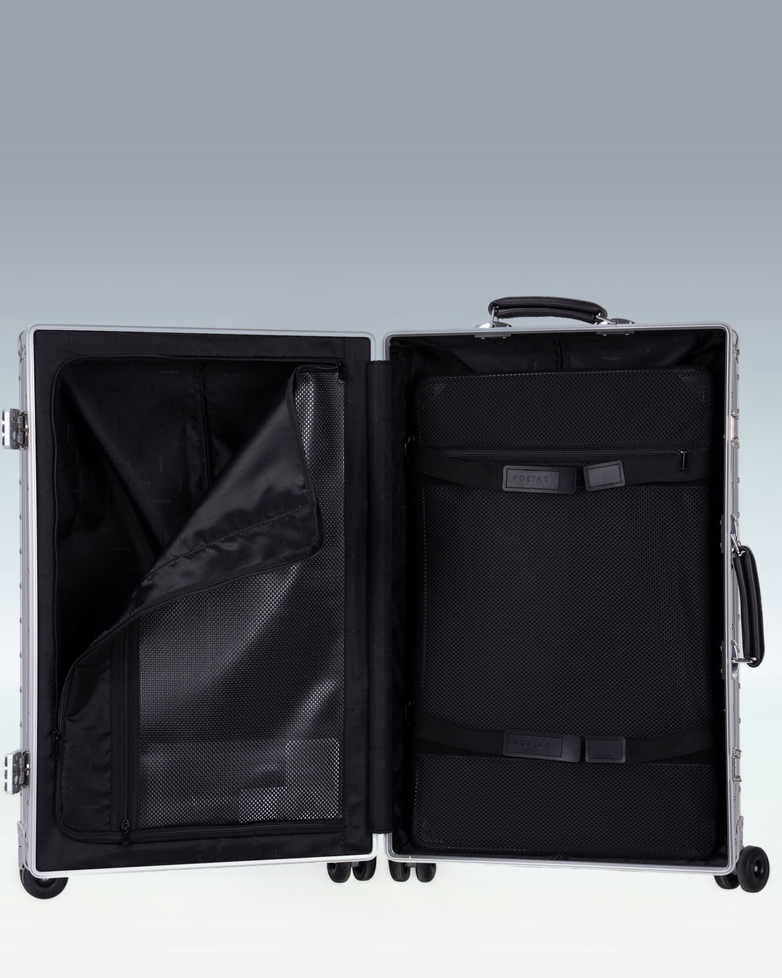 Portar Lucent aluminum luggage opened, showing the interior with one side open