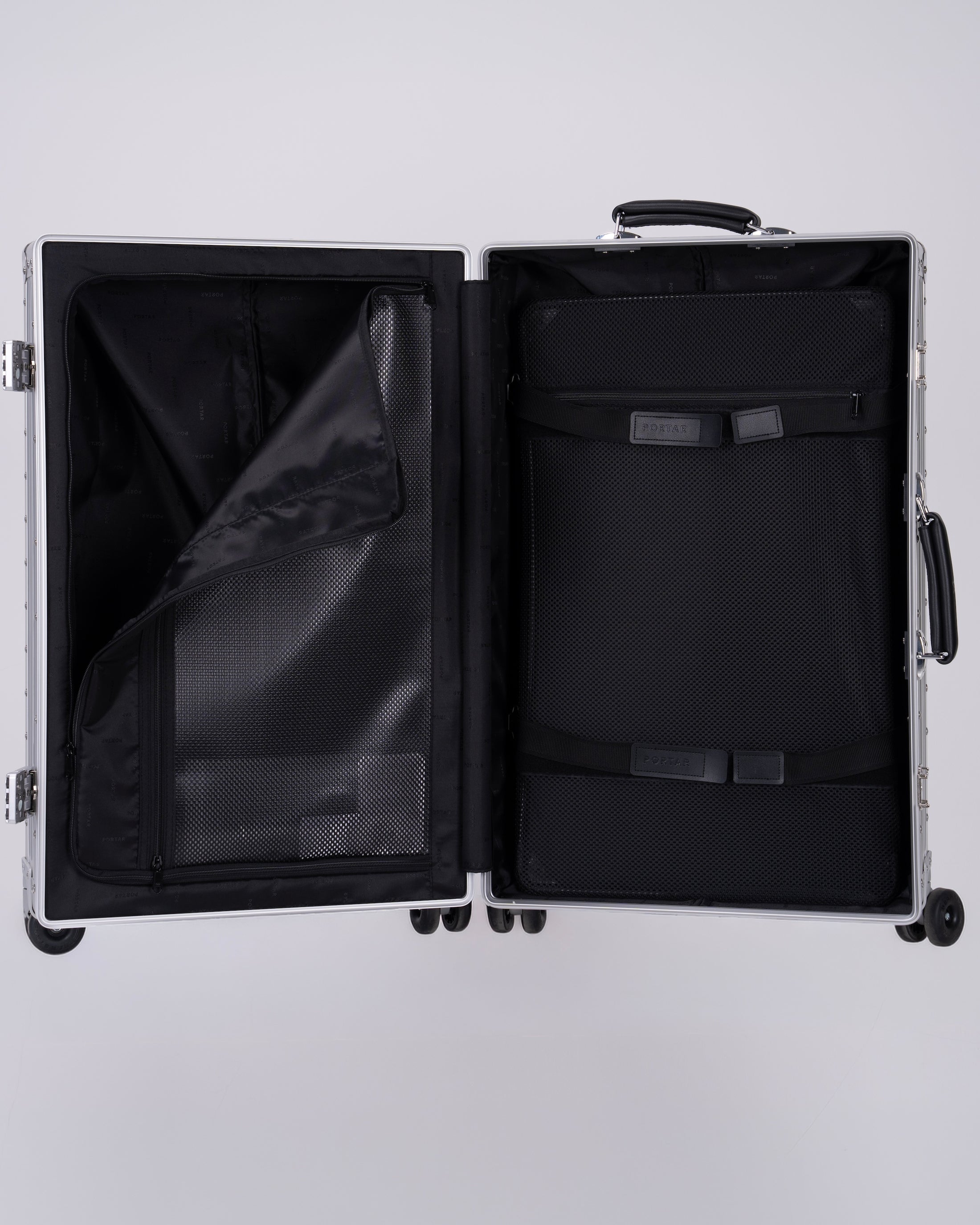 Portar Aluminum Carry on suitcase Open  with interior details with one side open on a white background