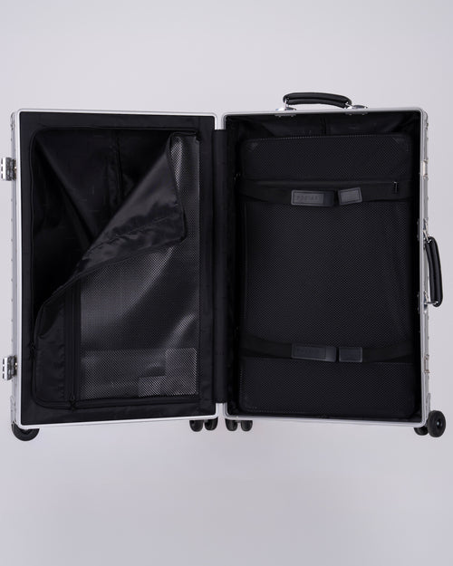 Portar Aluminum Carry on suitcase Open  with interior details with one side open on a white background