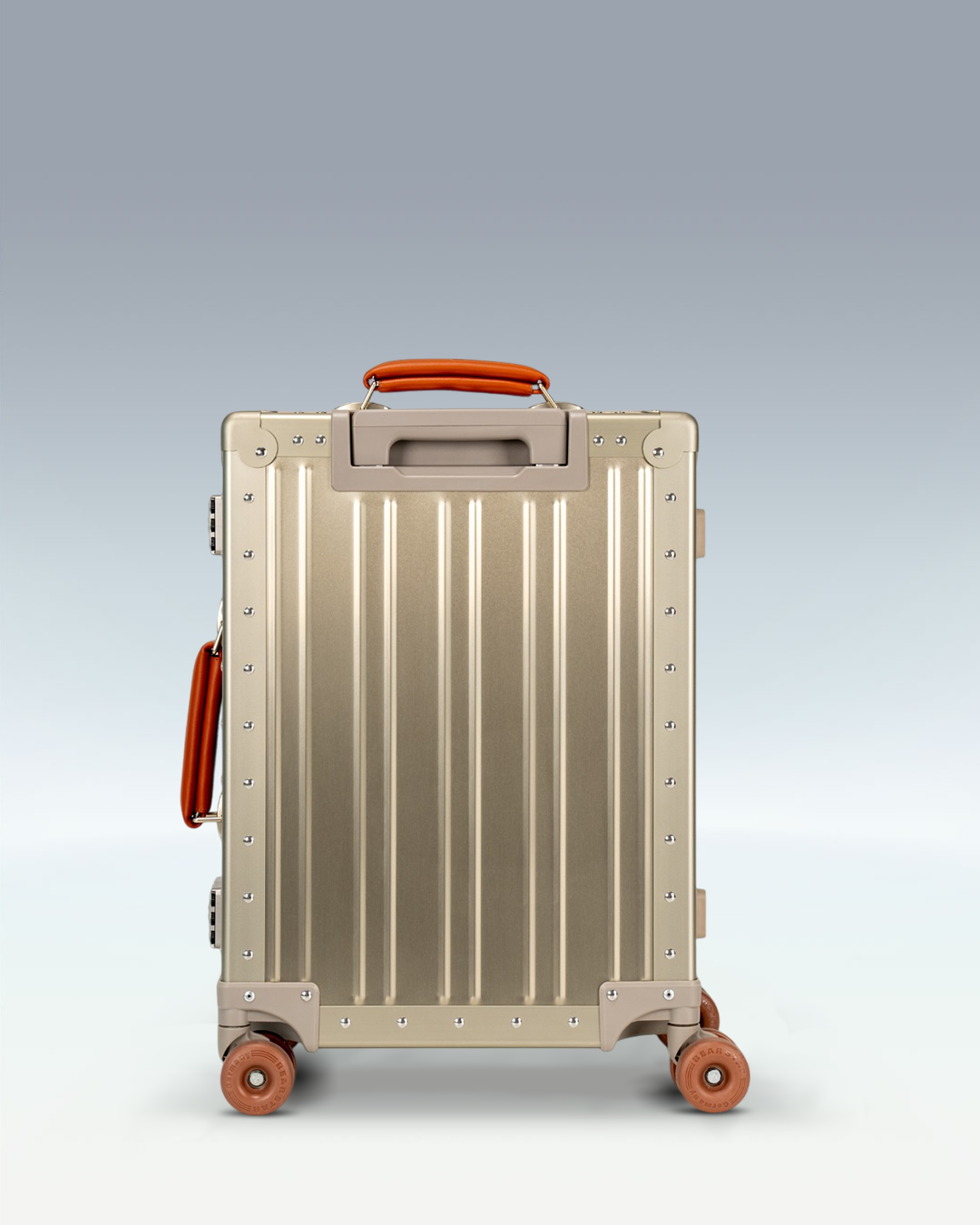 Portar Lucent aluminum carry-on luggage in Champagne Gold, back view