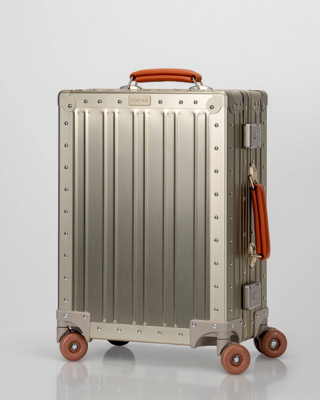 Lucent Champagne Gold Aluminum Carry-On Suitcase Perspective View by Portar