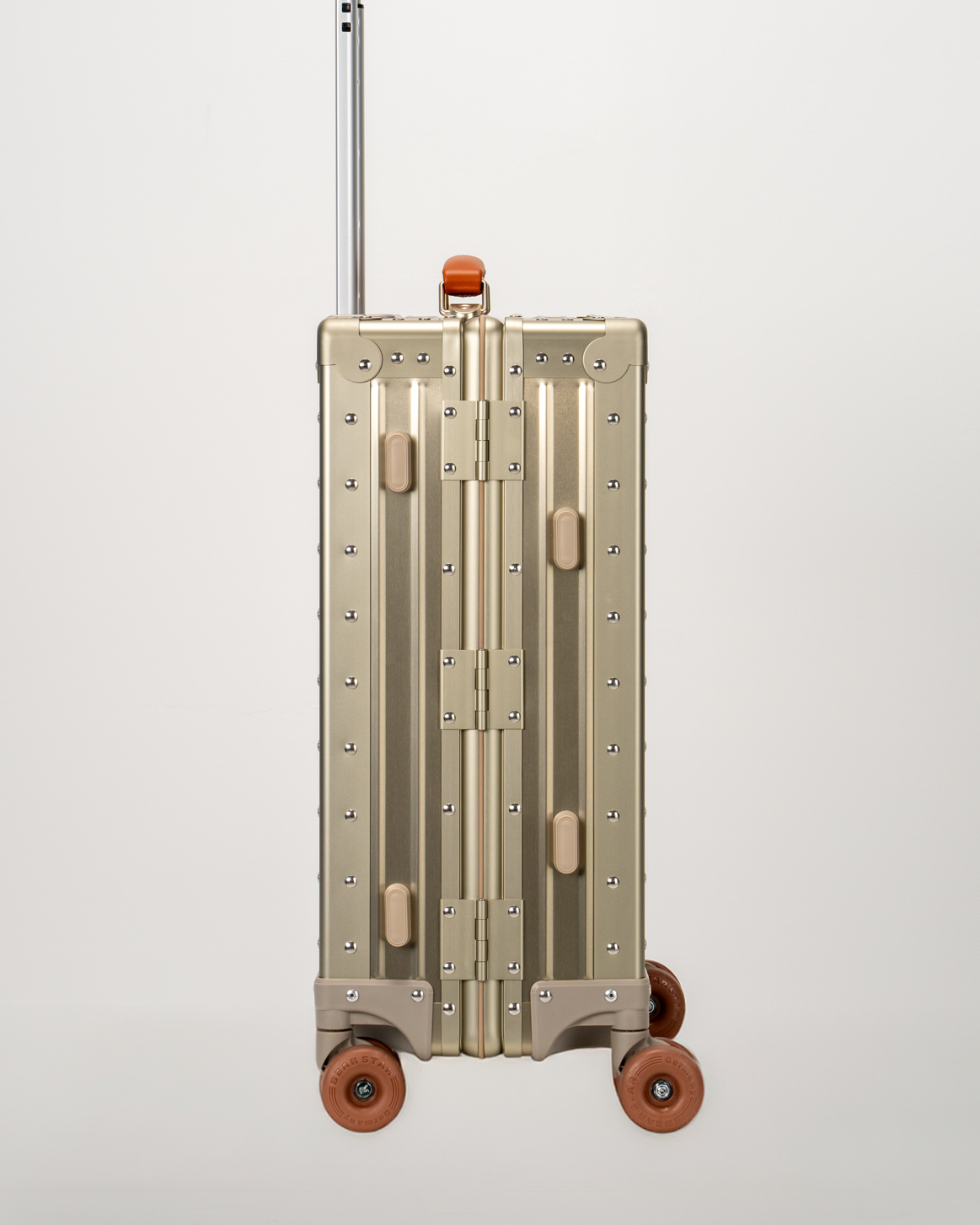 Lucent Champagne Gold Aluminum Carry-On Suitcase Side View by Portar