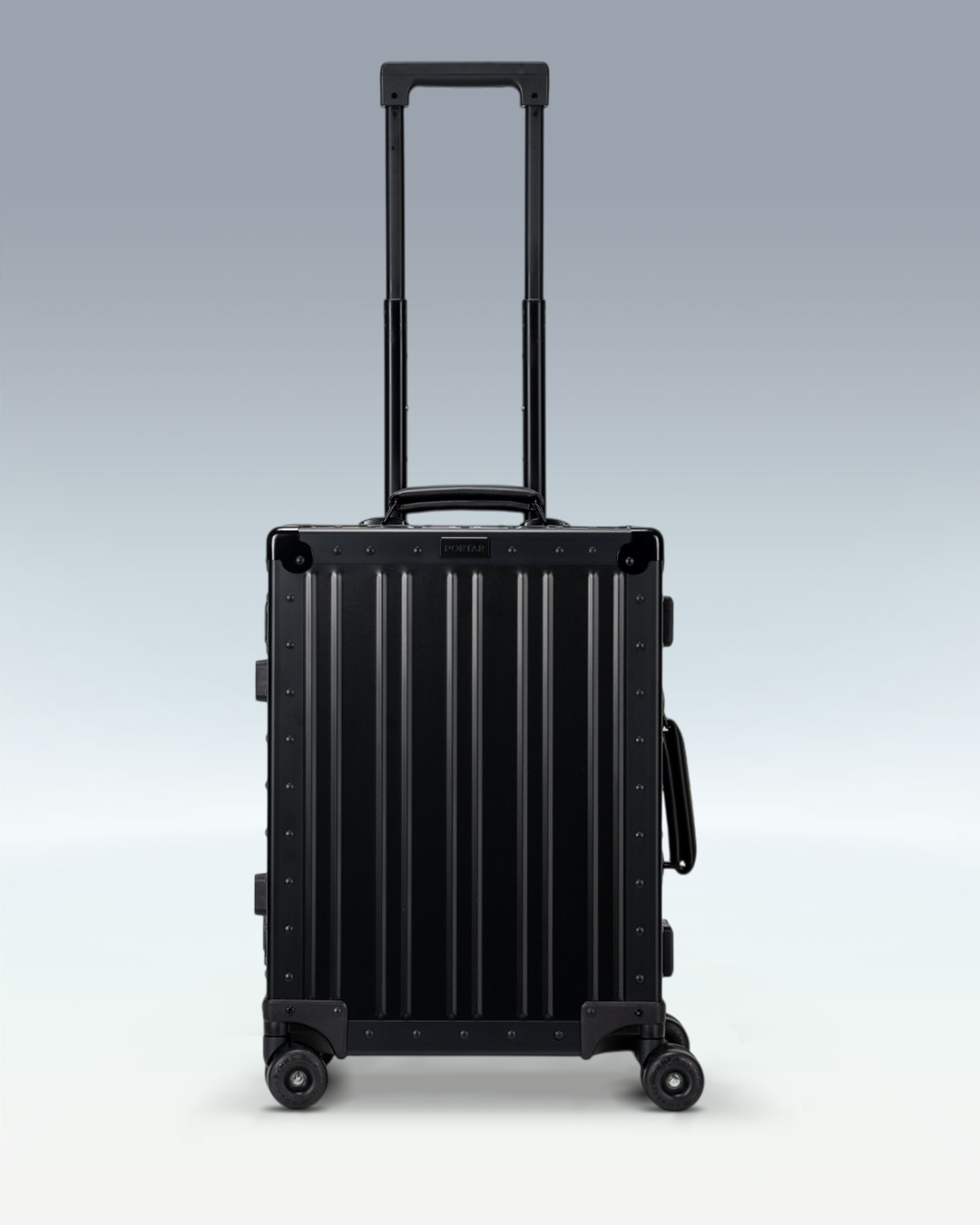 Portar Lucent aluminum carry-on luggage in Jet Black, front view with the telescoping handle extended
