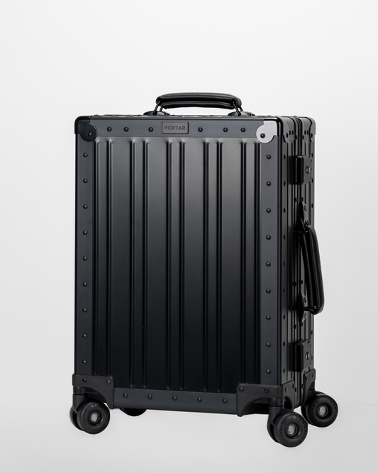 Lucent Jet Black Aluminum Carry-On Suitcase Perspective View by Portar