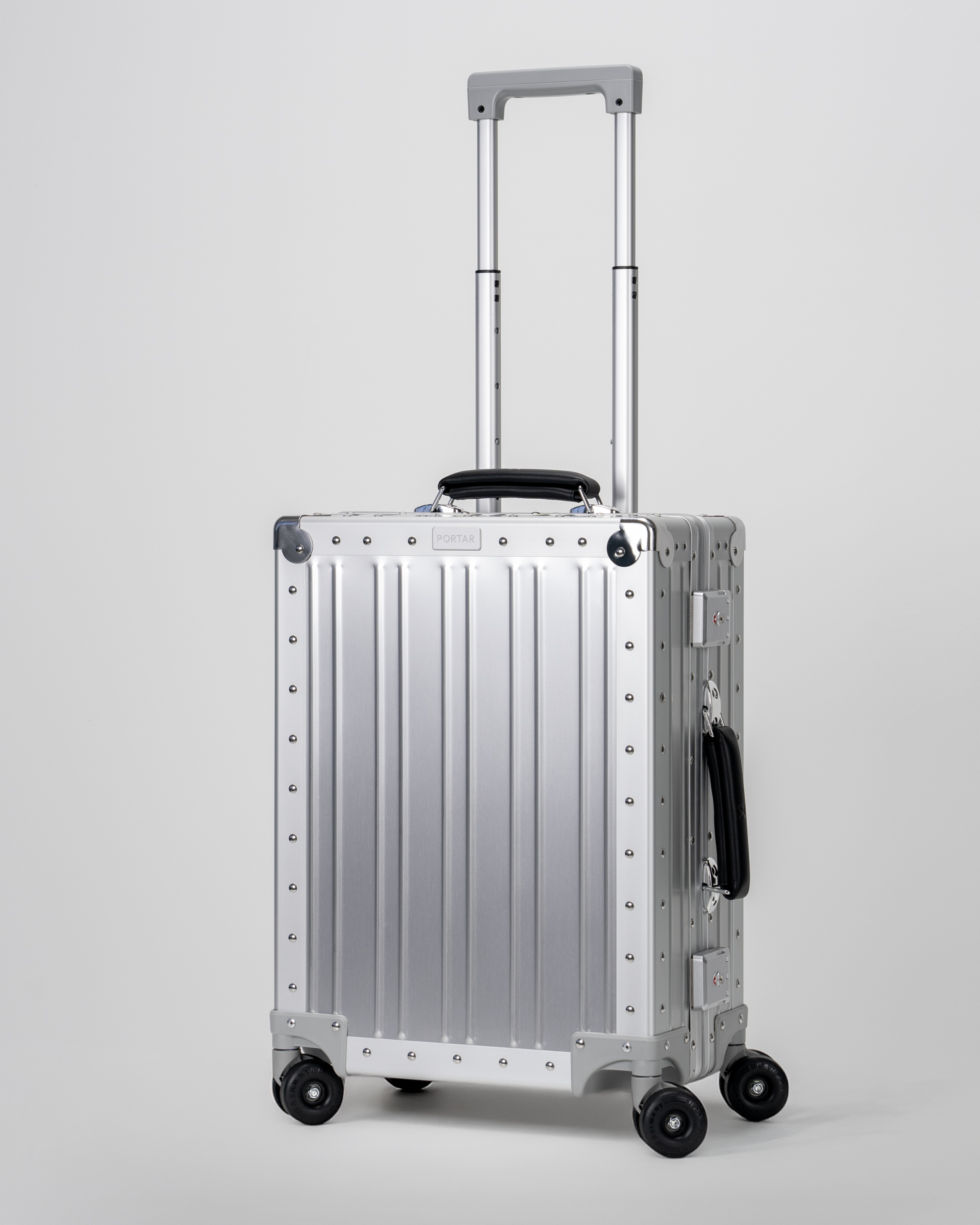 Lucent Lunar Silver Aluminum Carry-On Suitcase Perspective with Handle View by Portar