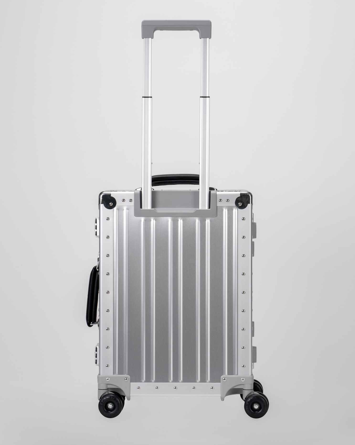 Lucent Lunar Silver Aluminum Carry-On Suitcase Back with Handle View by Portar