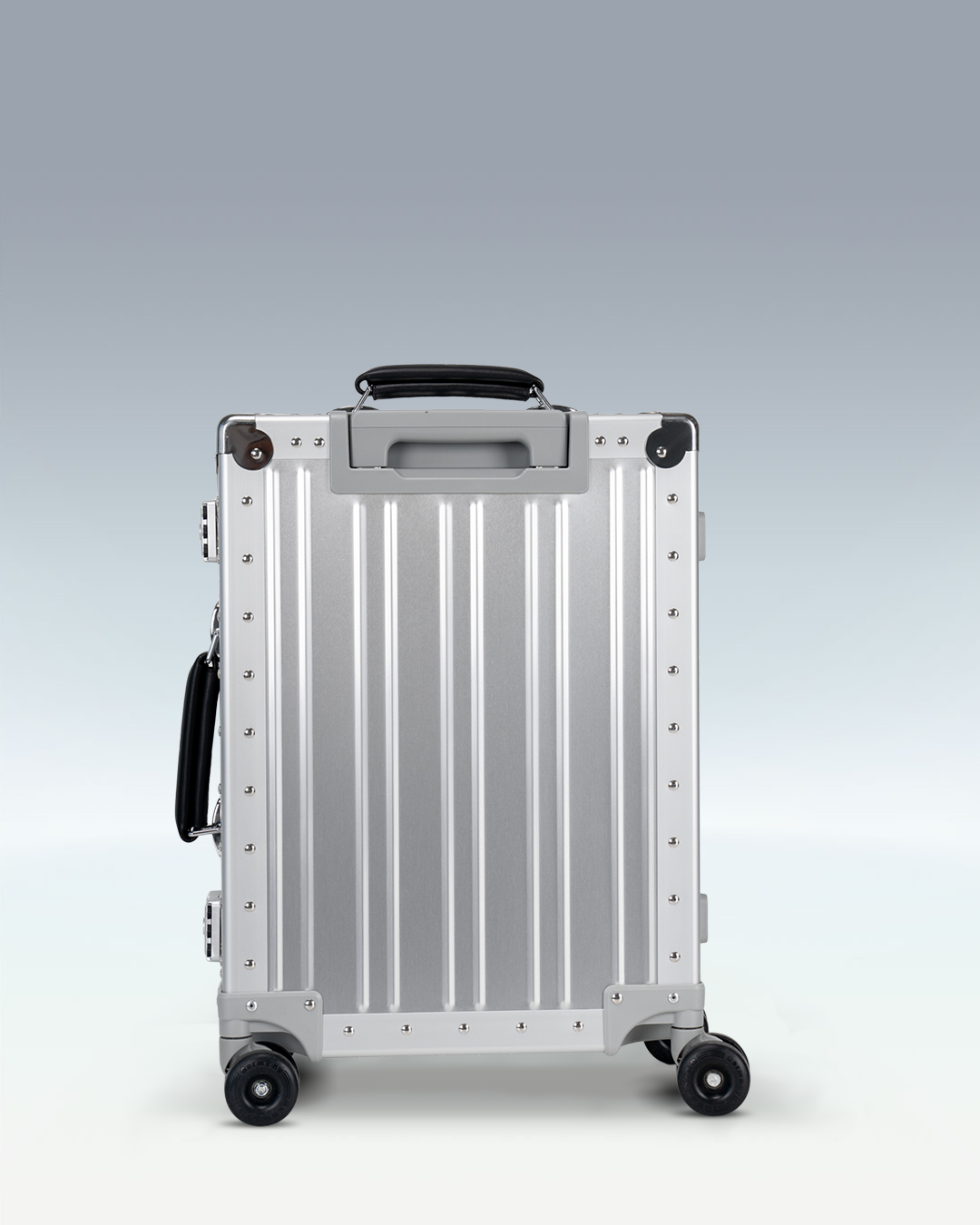 Portar Lucent aluminum carry-on luggage in Lunar Silver, back view