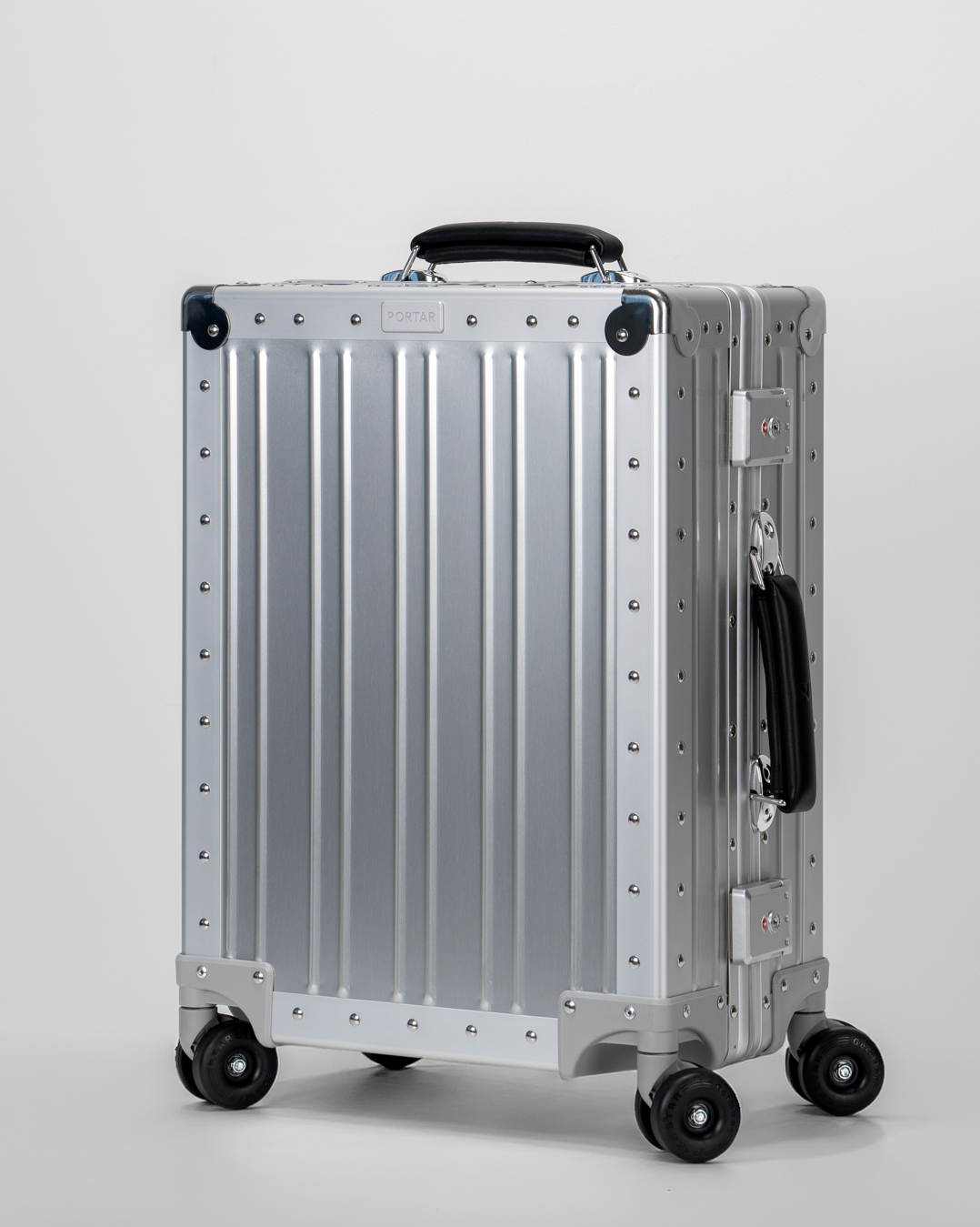 Lucent Lunar Silver Aluminum Carry-On Suitcase Perspective View by Portar