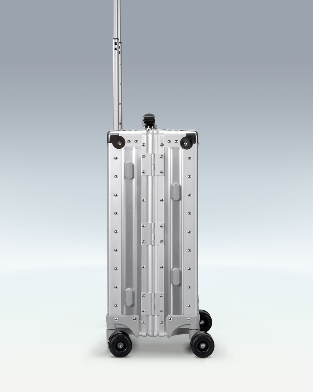 Portar Lucent aluminum carry-on luggage in Lunar Silver, side profile
