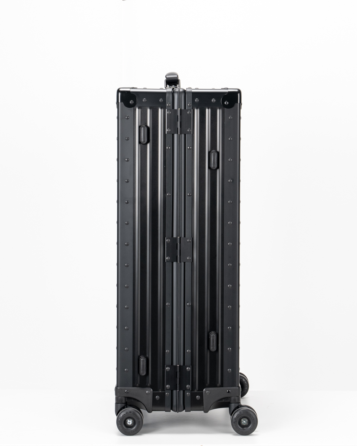 Lucent Jet Black Aluminum Check-In Suitcase Side View by Portar