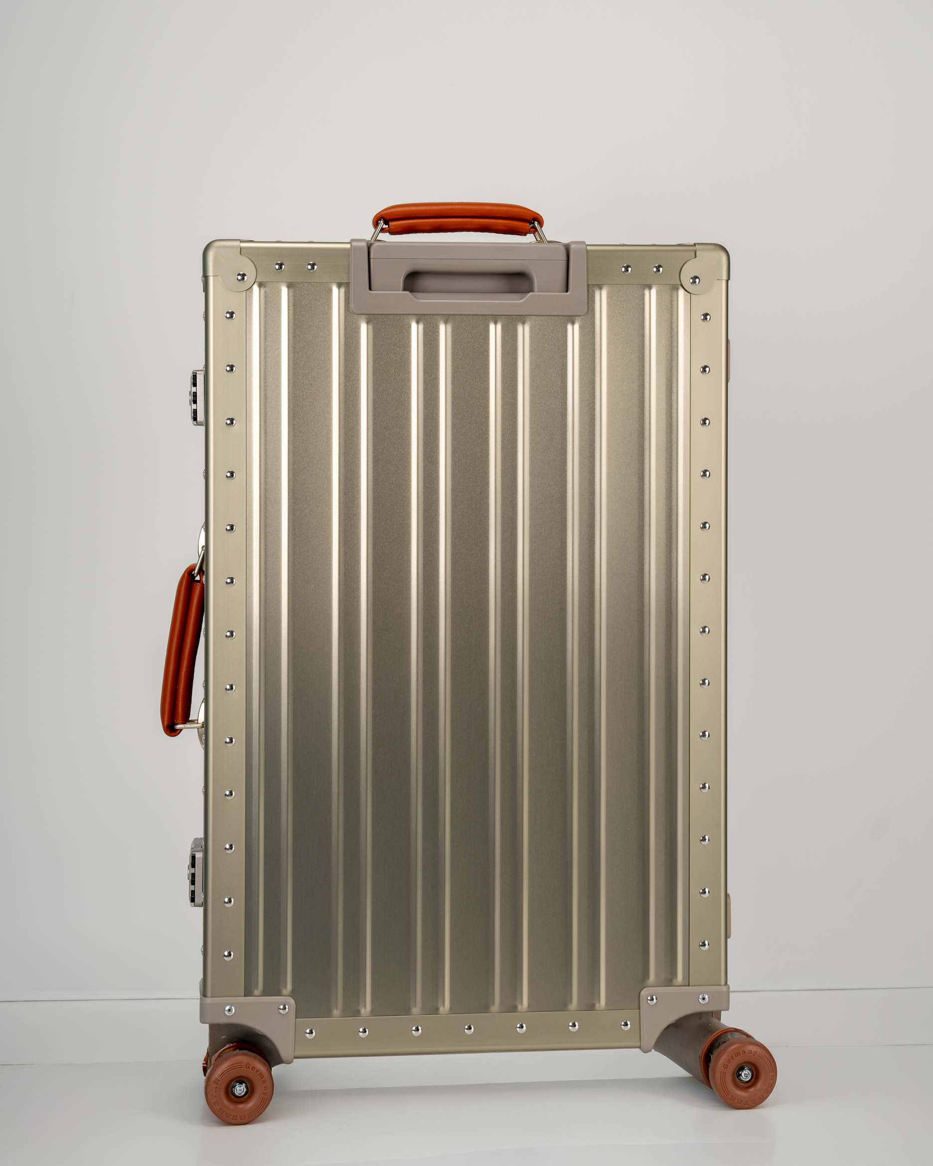 Lucent Champagne Gold Aluminum Check-In Suitcase Back View by Portar