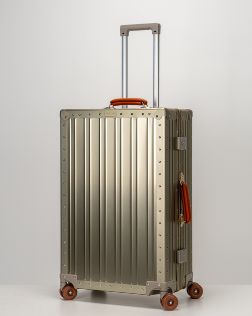 Lucent Champagne Gold Aluminum Check-In Suitcase Perspective with Handle View by Portar