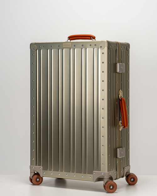 Lucent Champagne Gold Aluminum Check-In Suitcase Perspective View by Portar