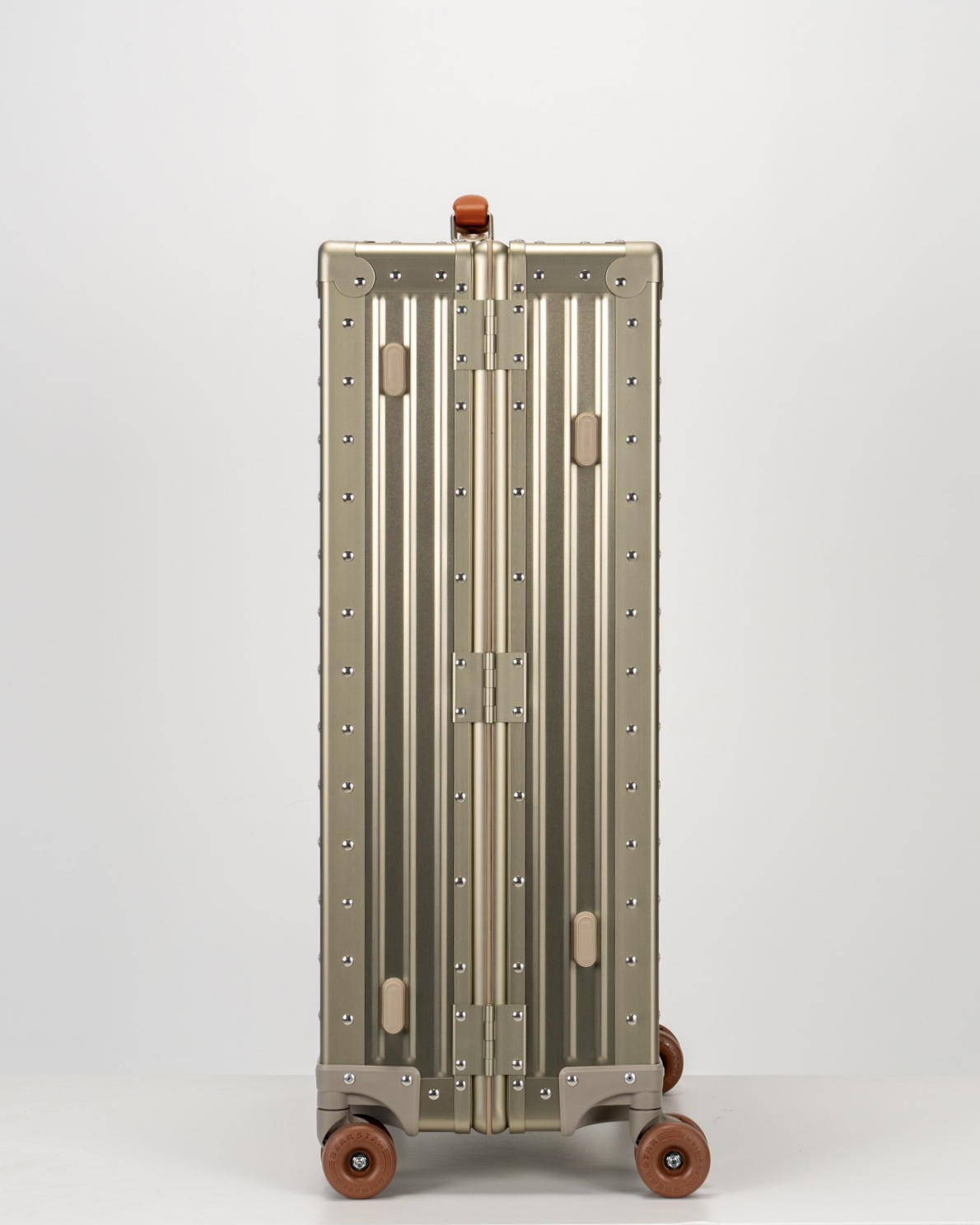 Lucent Champagne Gold Aluminum Check-In Suitcase Side View by Portar