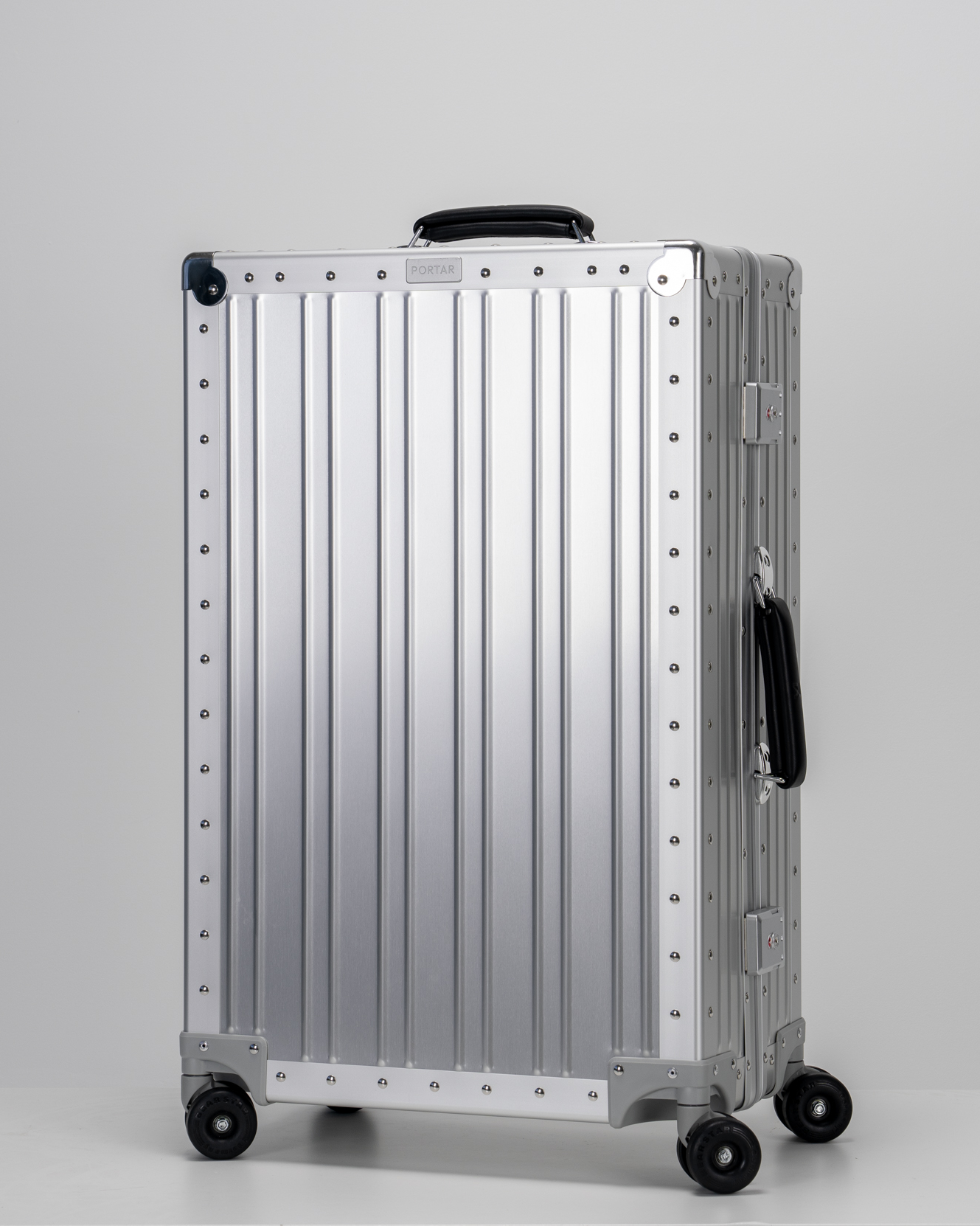 Lucent Lunar Silver Aluminum Check-In Suitcase Perspective View by Portar
