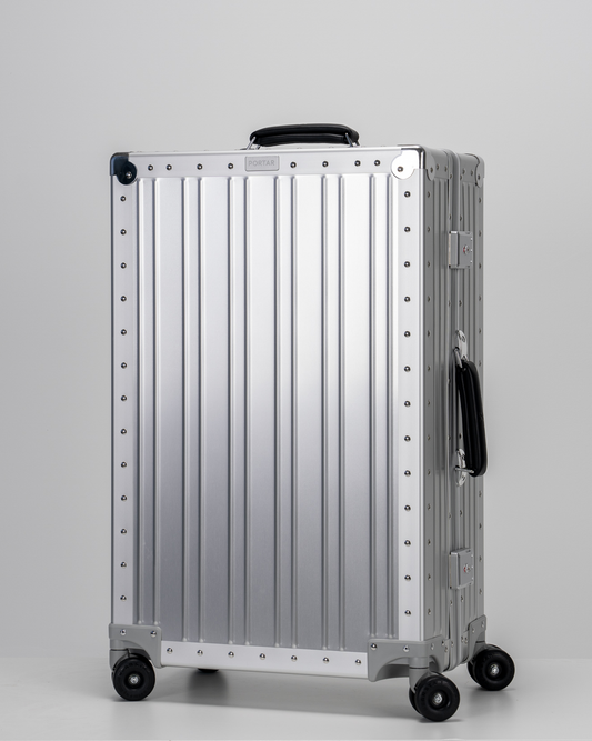 Lucent Lunar Silver Aluminum Check-In Suitcase Perspective View by Portar