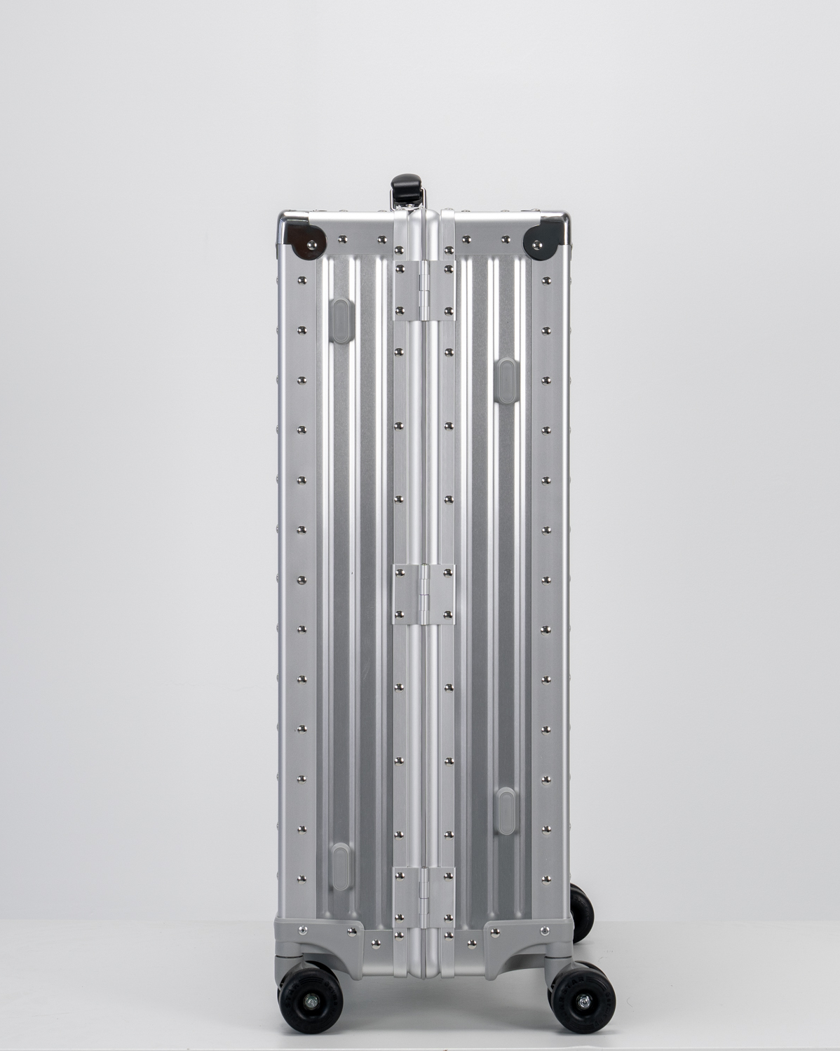 Lucent Lunar Silver Aluminum Check-In Suitcase Side View by Portar