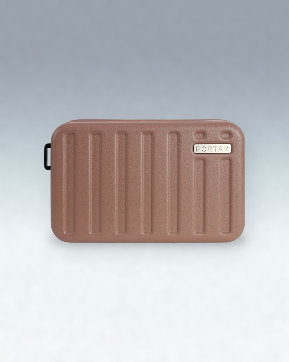 A brown PORTAR crossbody bag with a ribbed design and a small black carrying handle, shown on a light gray gradient background.