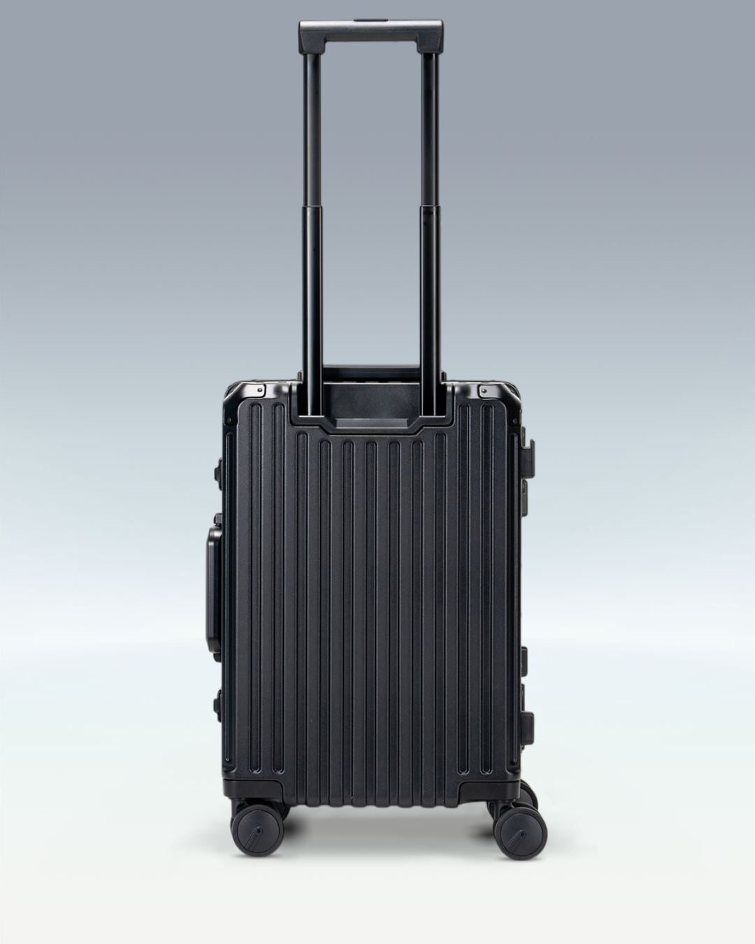 Portar Valence EdgeFrame carry-on luggage in Jet Black, back view with the telescoping handle extended