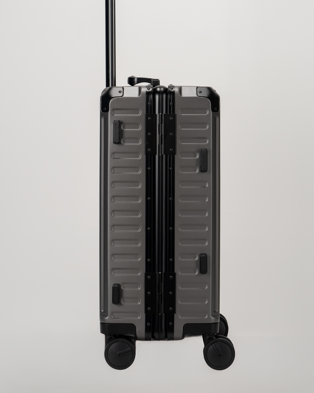 Valence Dark Gull Gray Polycarbonate Shell with Aluminum EdgeFrame Carry-On Suitcase Side View by Portar