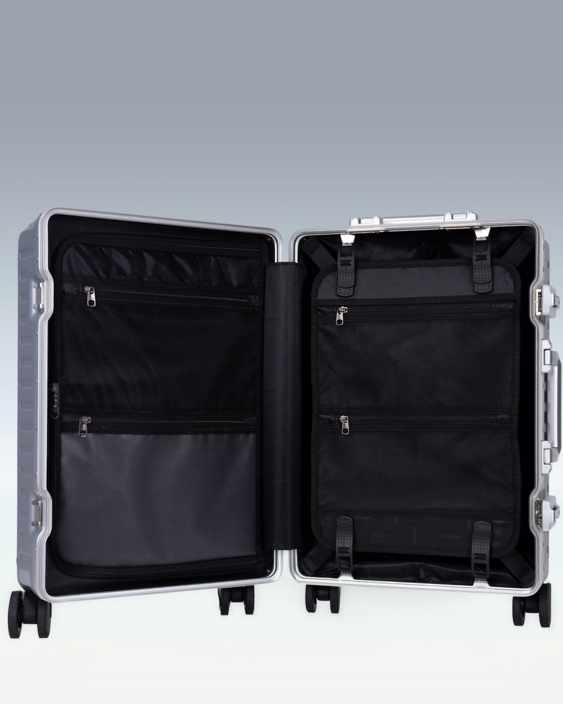 Portar Valence polycarbonate shell with aluminum EdgeFrame luggage opened, showing the black interior