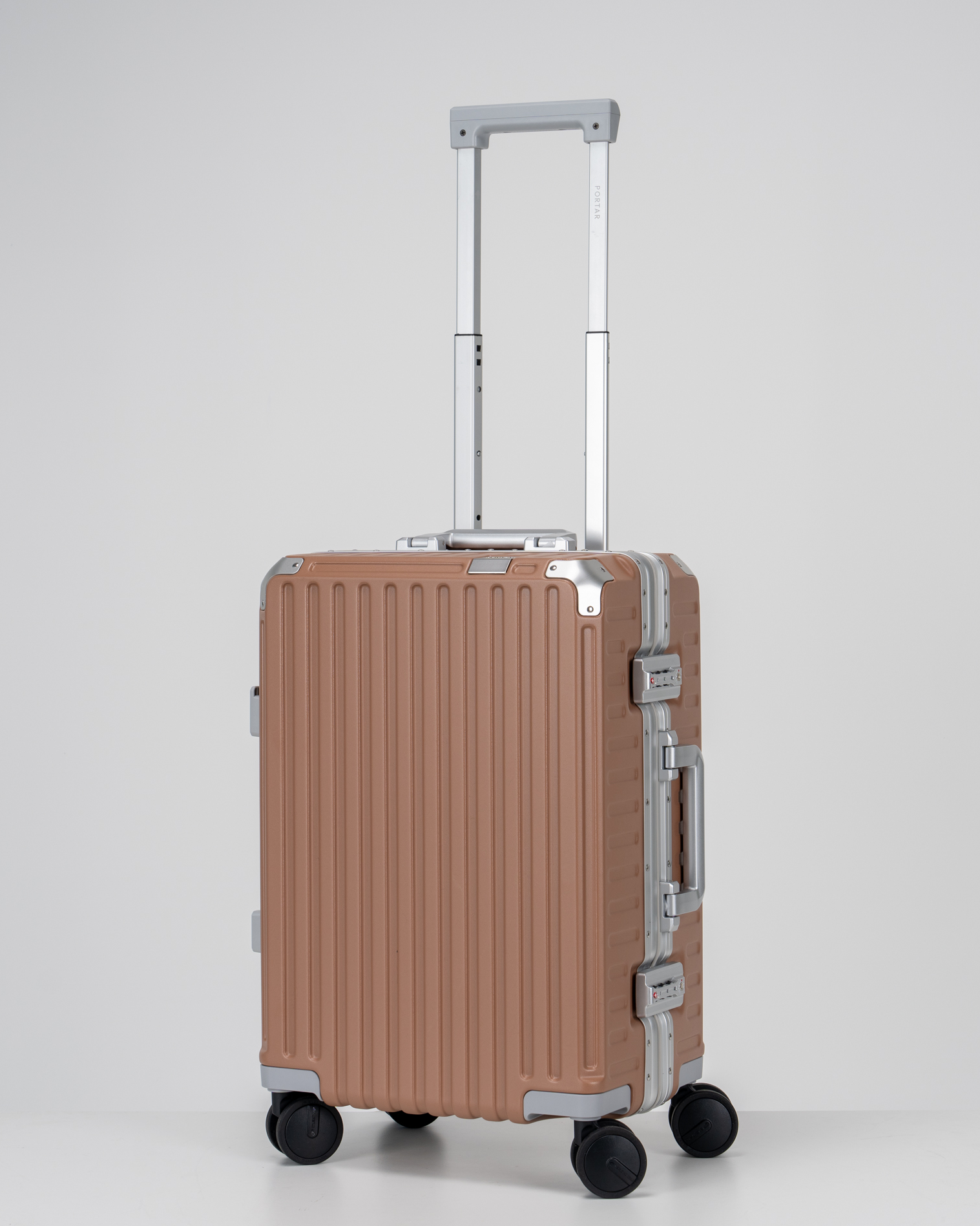 Valence Mocha Mousse Brown Polycarbonate Shell with Aluminum EdgeFrame Carry-On Suitcase Perspective with Handle View by Portar
