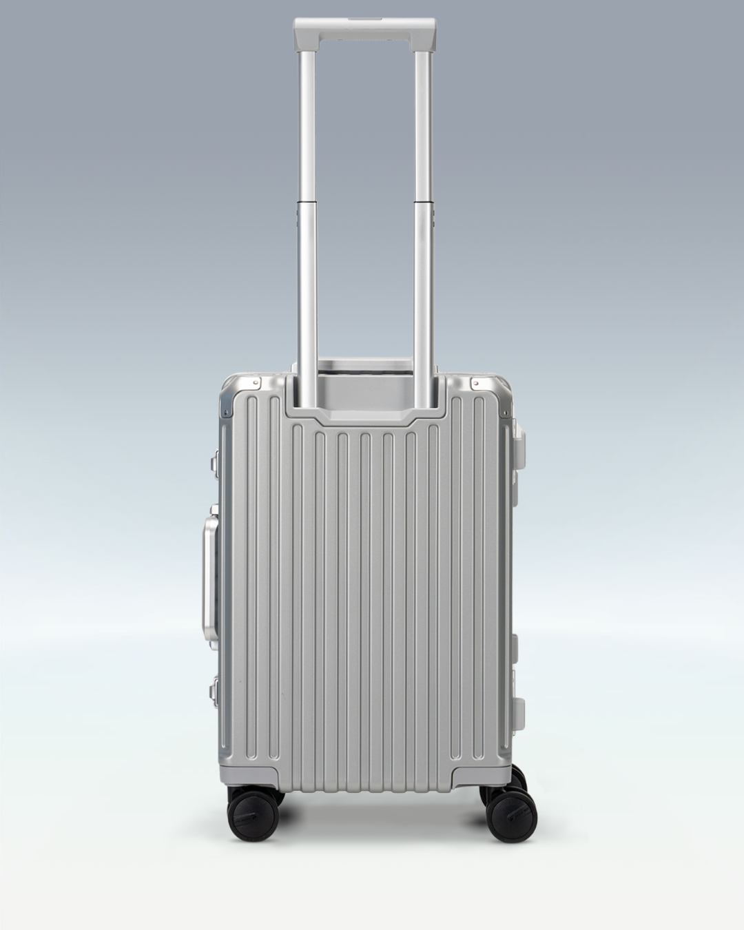 Portar Valence EdgeFrame carry-on luggage in Lunar Silver, back view with the telescoping handle extended