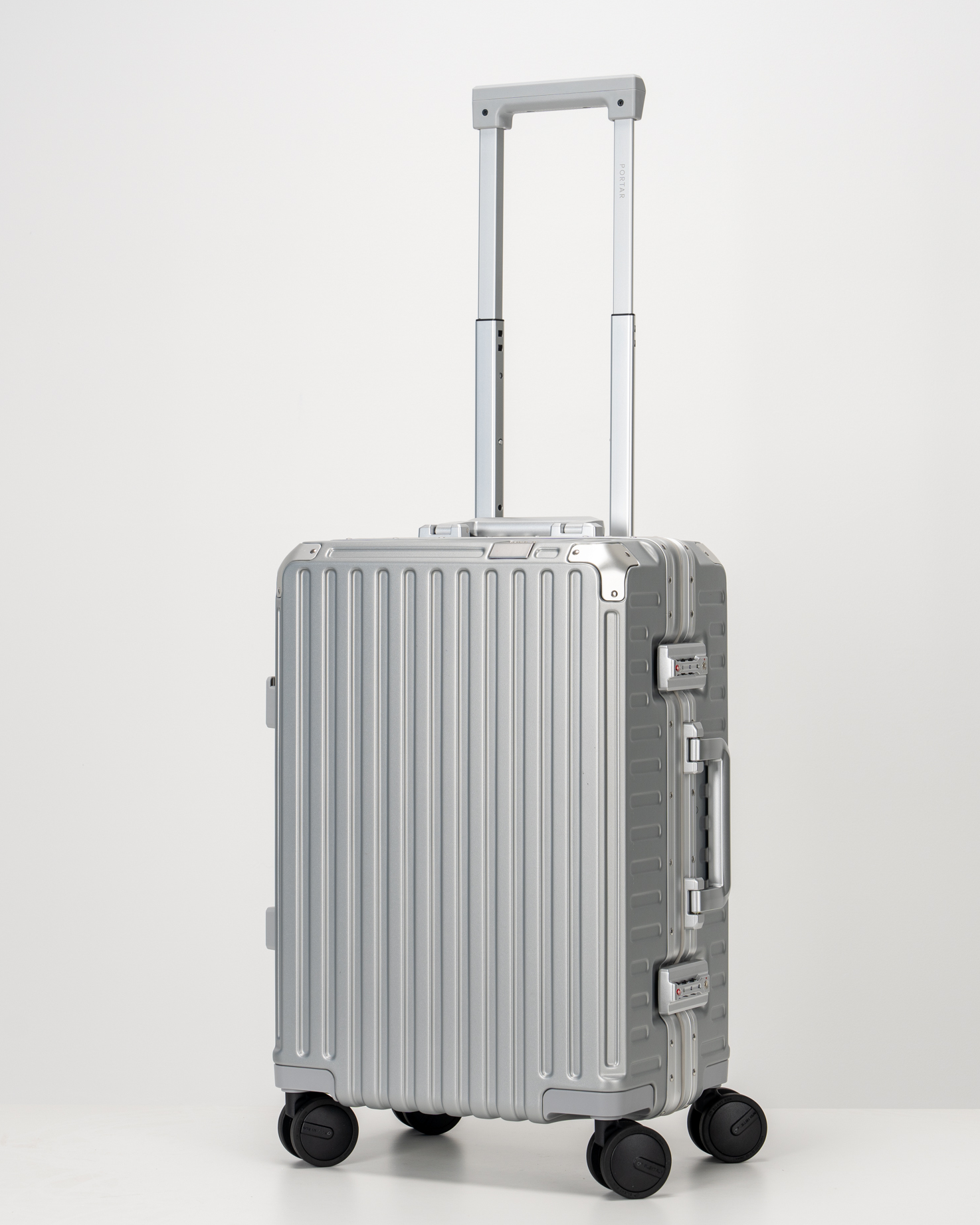 Valence Lunar Silver Polycarbonate Shell with Aluminum EdgeFrame Carry-On Suitcase Perspective with Handle View by Portar