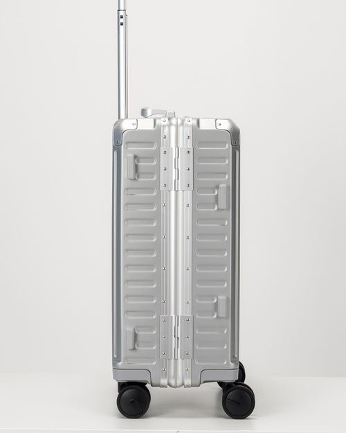Valence Lunar Silver Polycarbonate Shell with Aluminum EdgeFrame Carry-On Suitcase Side View by Portar
