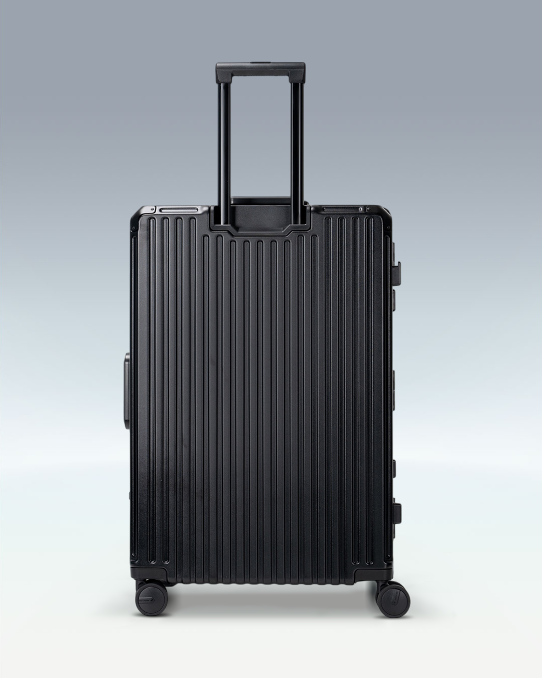 Portar Valence EdgeFrame checked luggage in Jet Black, back view with the telescoping handle extended