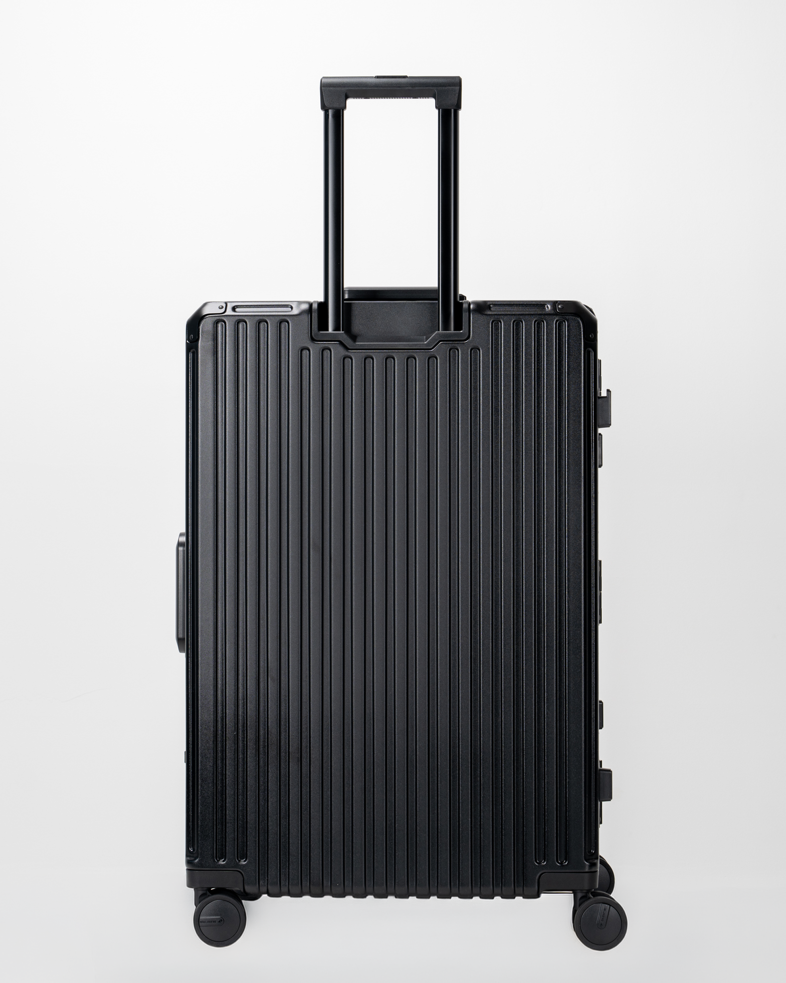 Valence Jet Black Polycarbonate Shell with Aluminum EdgeFrame Check-In Suitcase Back View by Portar