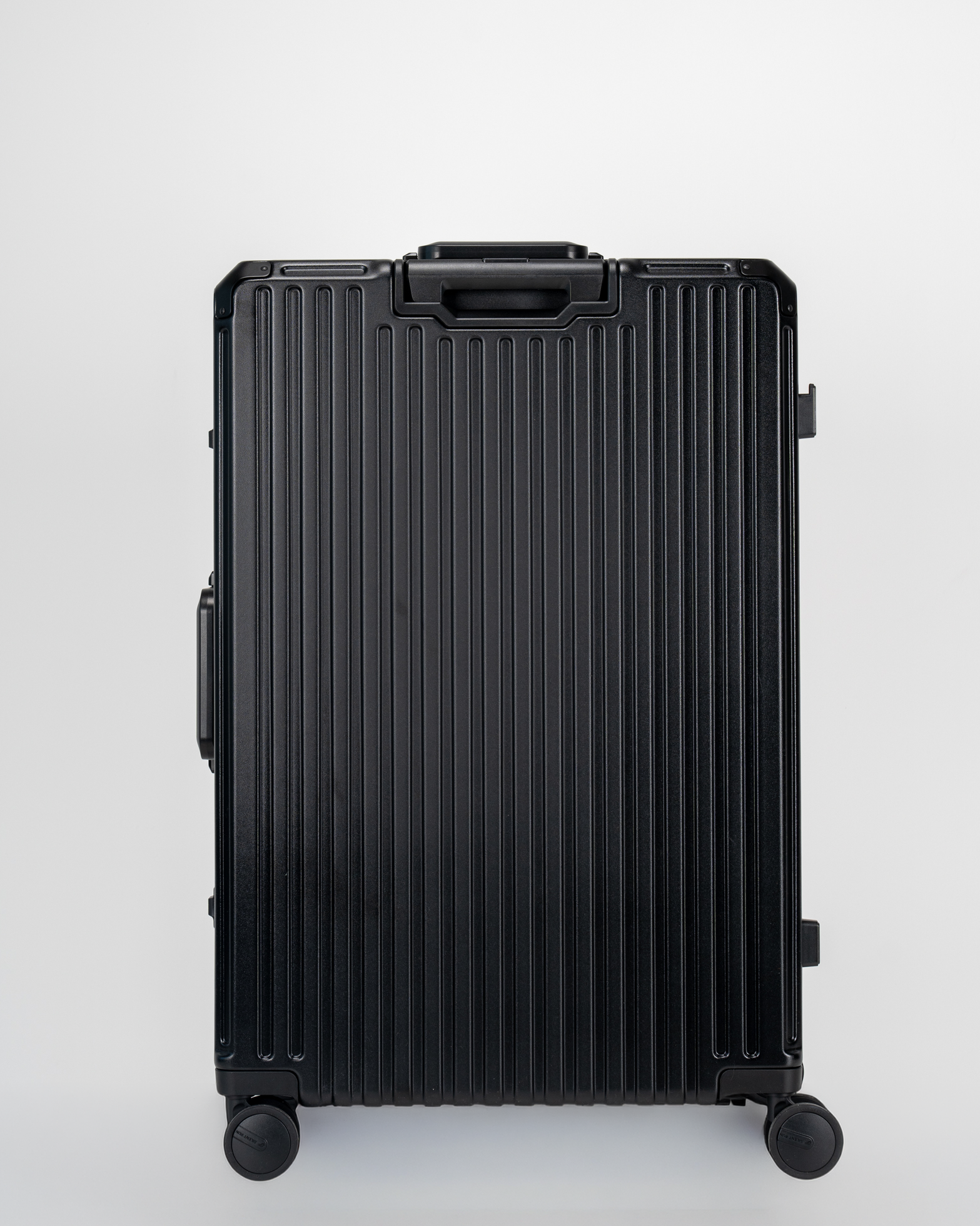 Valence Jet Black Polycarbonate Shell with Aluminum EdgeFrame Check-In Suitcase Back View by Portar