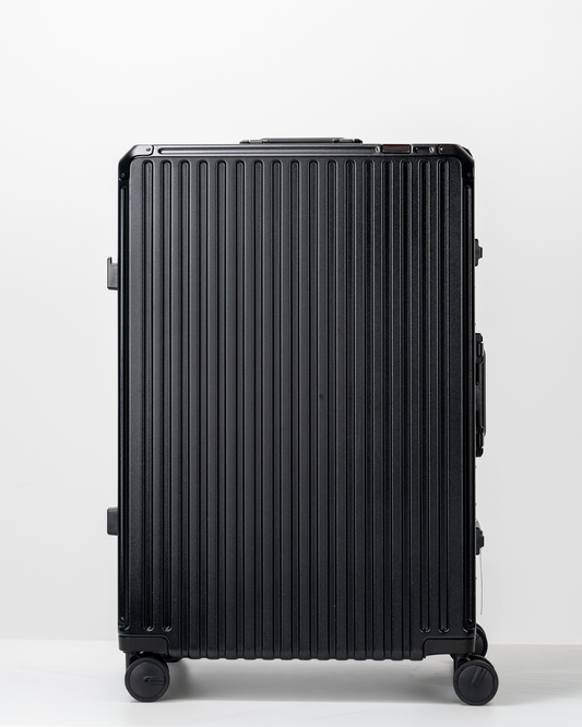 Valence Jet Black Polycarbonate Shell with Aluminum EdgeFrame Check-In Suitcase Front View by Portar