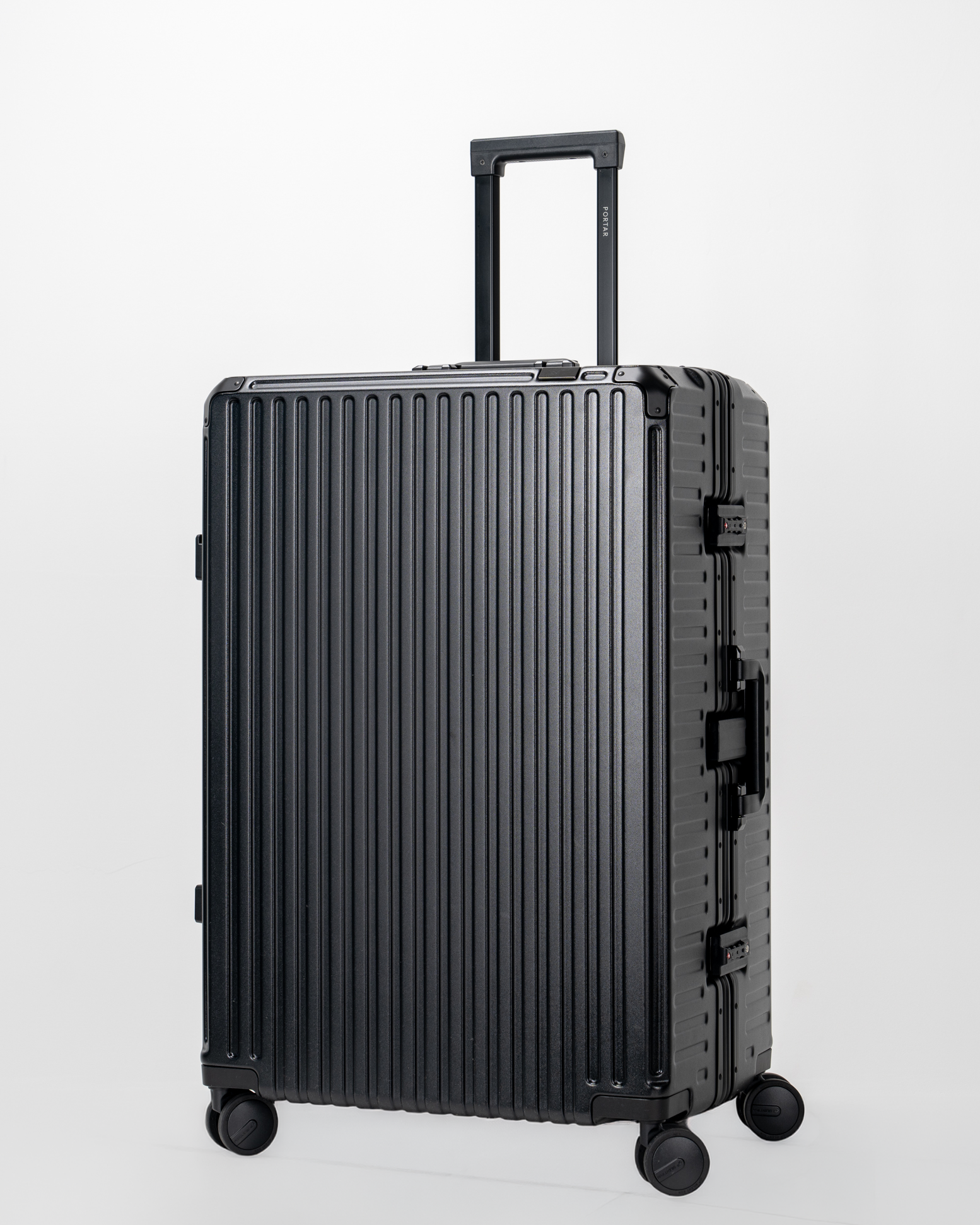 Valence Jet Black Polycarbonate Shell with Aluminum EdgeFrame Check-In Suitcase Perspective with Handle View by Portar