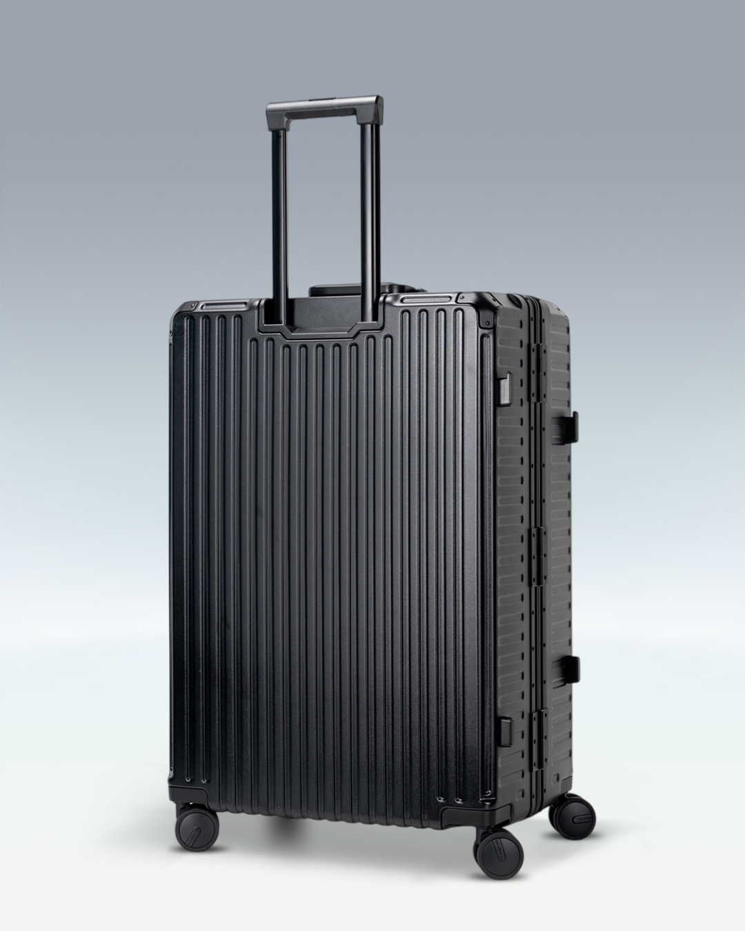 Portar Valence EdgeFrame checked luggage in Jet Black, angled side view with the telescoping handle extended