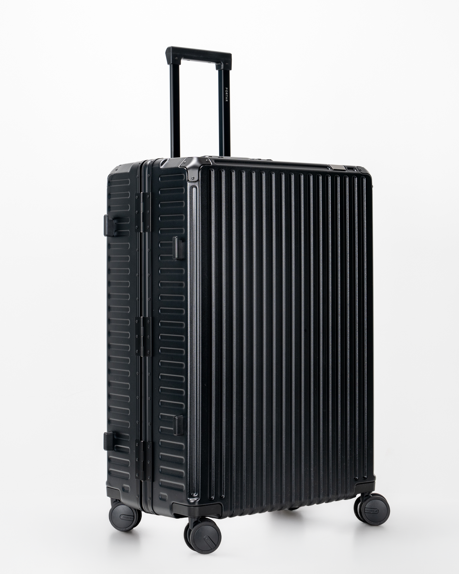 Valence Jet Black Polycarbonate Shell with Aluminum EdgeFrame Check-In Suitcase Side Angle View by Portar
