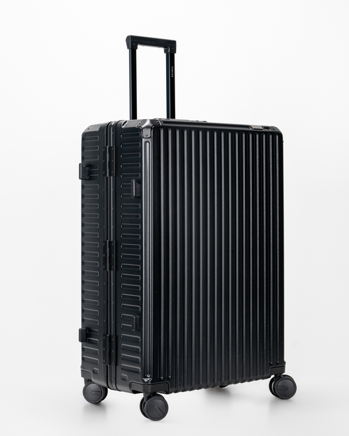 Valence Jet Black Polycarbonate Shell with Aluminum EdgeFrame Check-In Suitcase Side Angle View by Portar