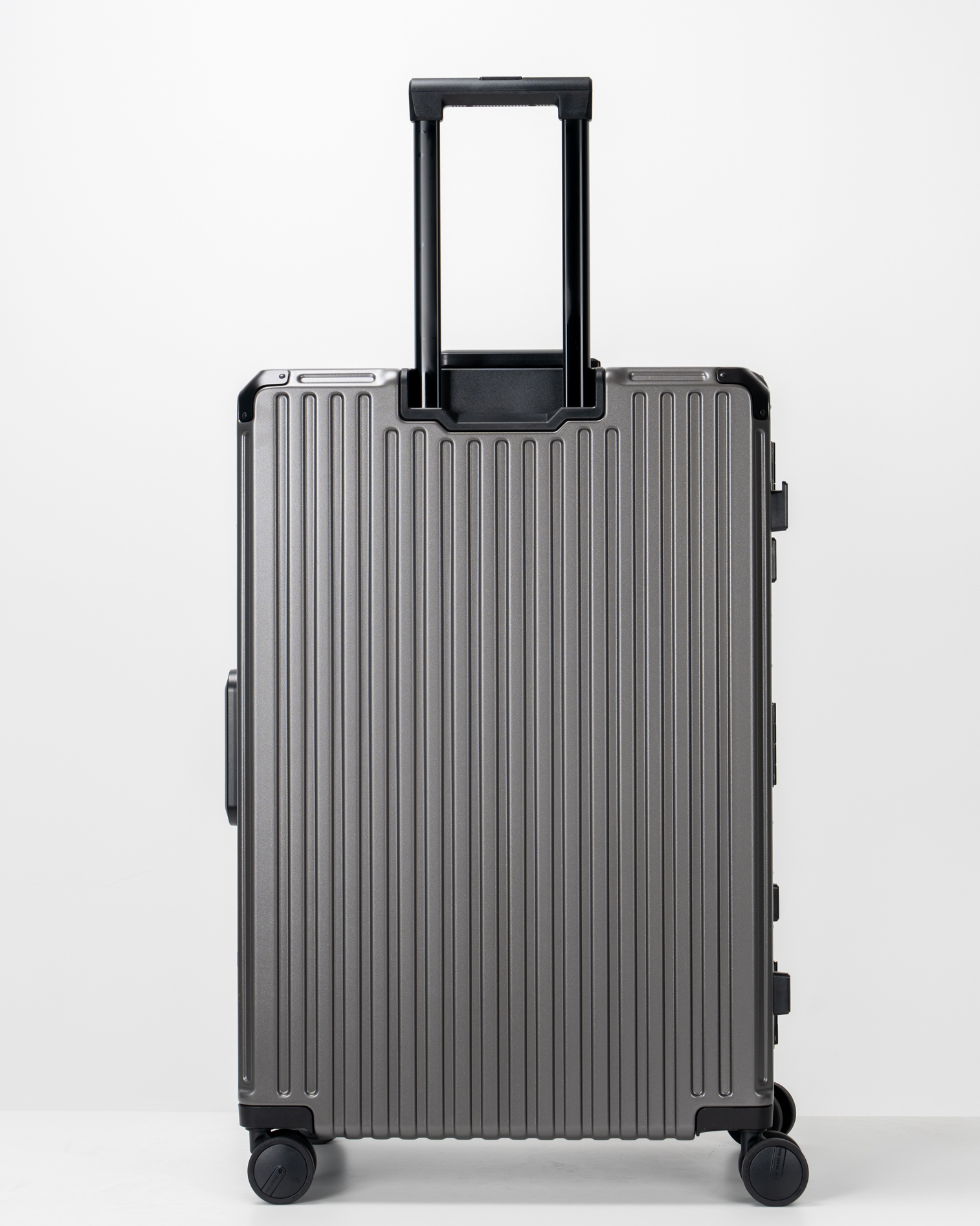 Valence Dark Gull Gray Polycarbonate Shell with Aluminum EdgeFrame Check-In Suitcase Back with Handle View by Portar