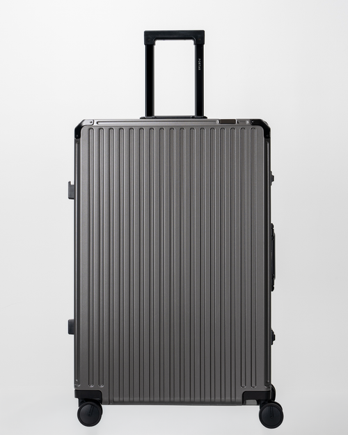 Valence Dark Gull Gray Polycarbonate Shell with Aluminum EdgeFrame Check-In Suitcase Front with Handle View by Portar